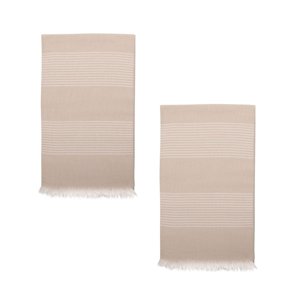 Two beige hammam towels with fine white stripes on a white background.