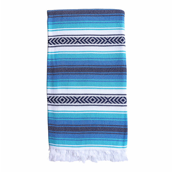 Playa hammam towel in blue and turquoise stripes, folded, from Sand and Salt