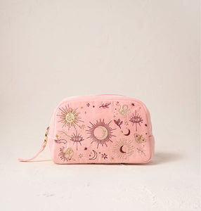 Image of a pink velvet embroidered makeup bag.