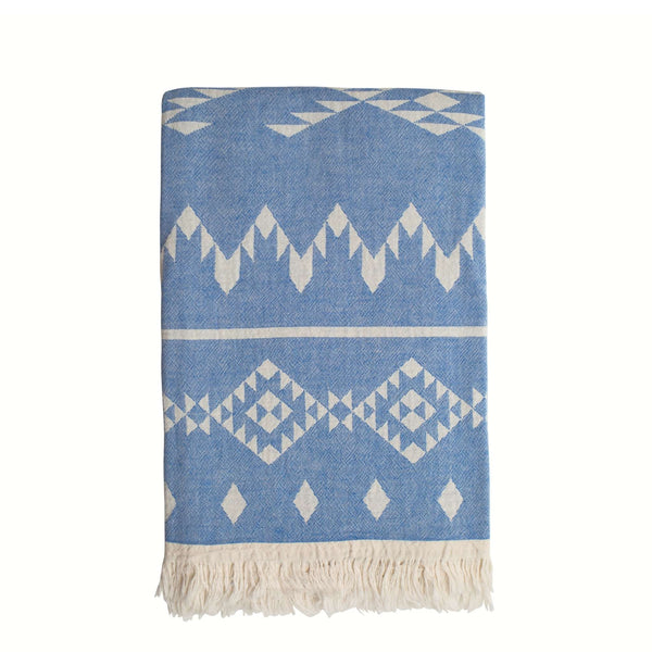 Bestselling lightweight 'Belize' hammam towel from Sand and Salt in Washed Blue.