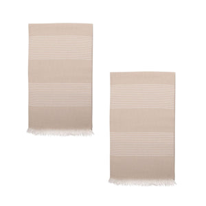 Two beige hammam towels with fine white stripes on a white background.