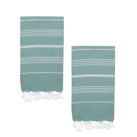 Two aqua green hammam towels with white stripes and tassels on a white background.