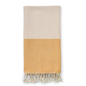 Image of Capri hammam towel in saffron yellow and white.