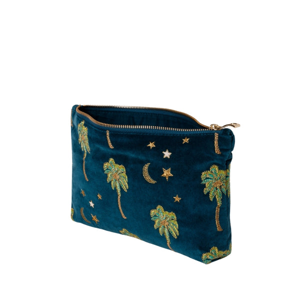 side view of Elizabeth Scarlett Midnight Palm Velvet Everyday Pouch in Teal with palm trees and stars design