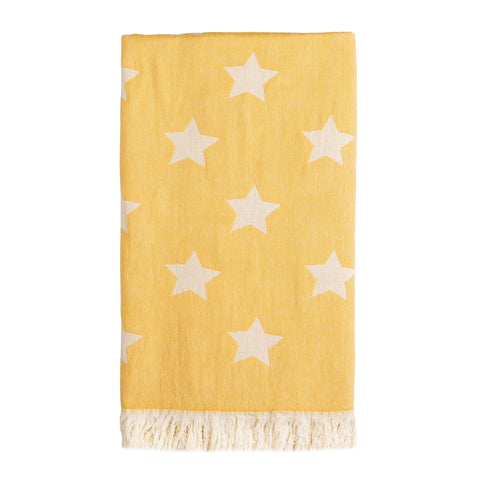 100% cotton hammam towel, in a sunny yellow with white stars design. Fringing at both ends.